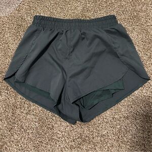 Girlfriend Collective dark green running shorts
